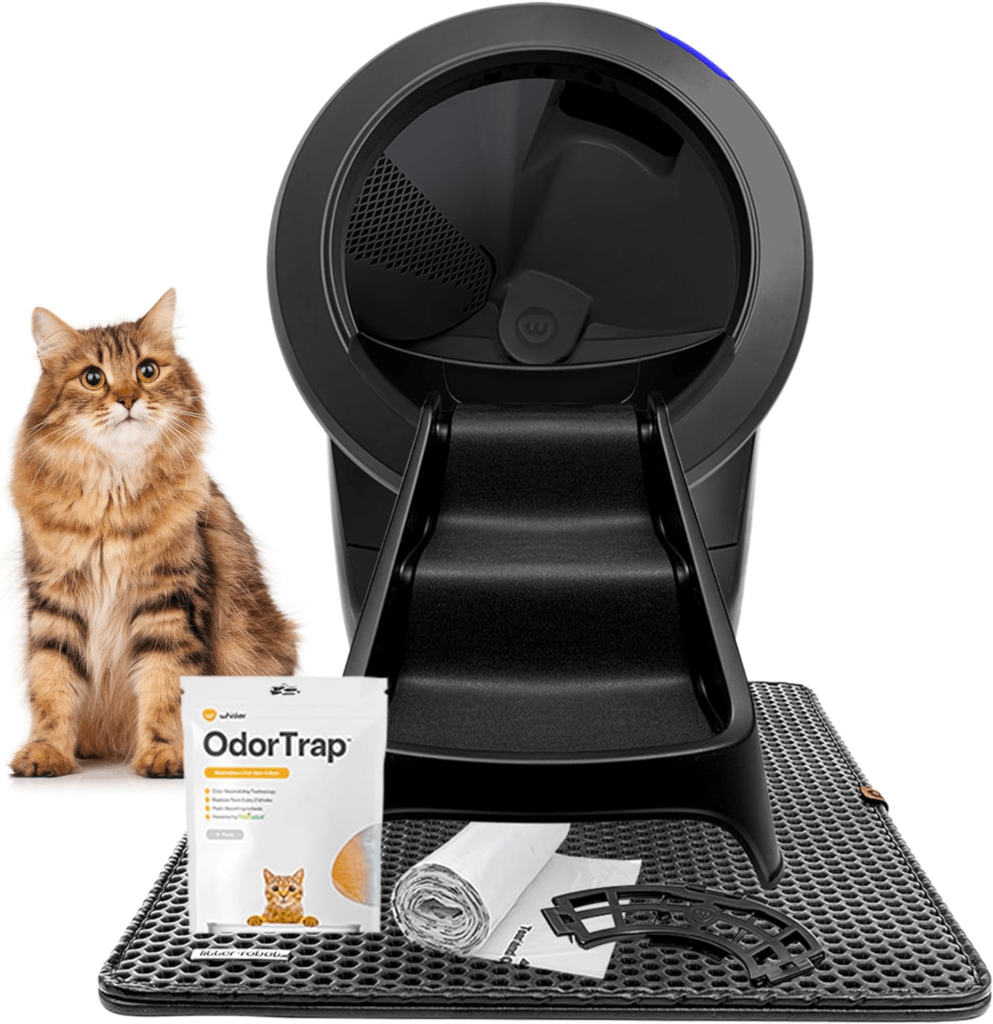 Cat next to Robot Litter Box